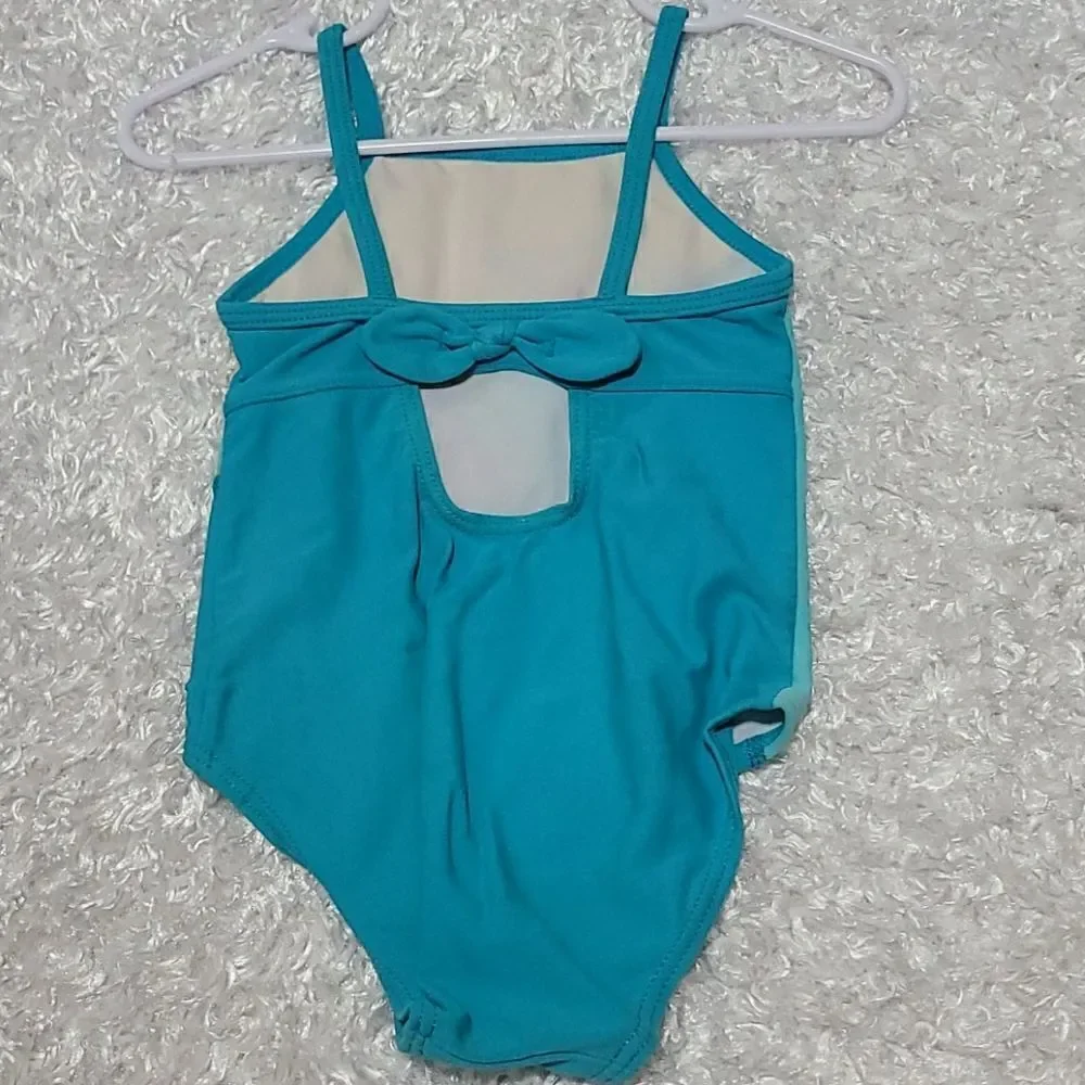 Girls one piece swimsuit palmtree/ flower
